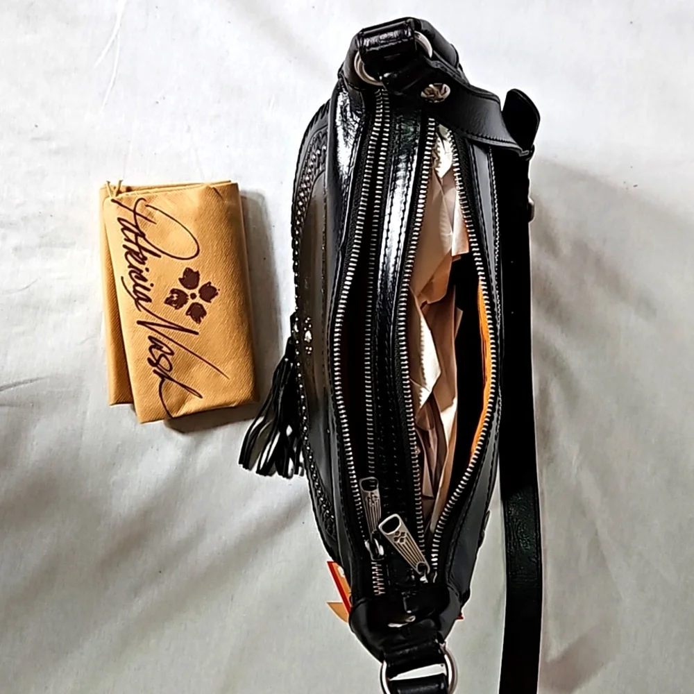 Patricia Nash vintage distressed leather Camila hobo shoulder bag.